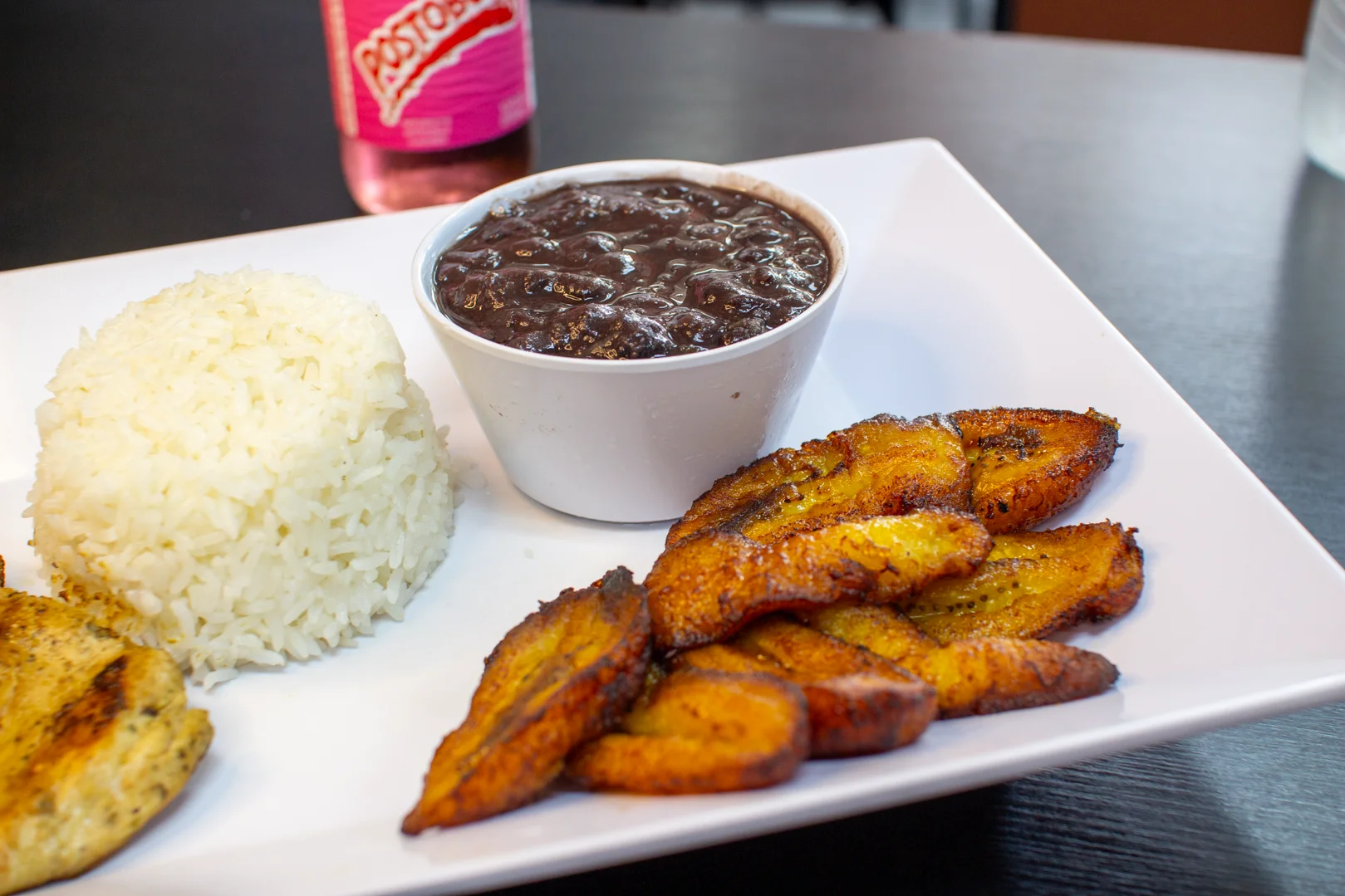 Rice, black beans, meat and sweet plantains